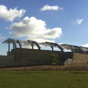 Auditorium exterior with cable mesh structure
